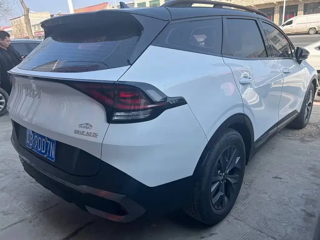 Kia Sportage — фото 10