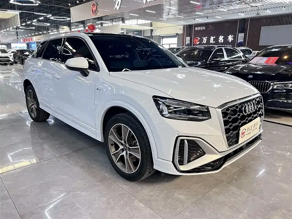 Audi Q2L — фото 10