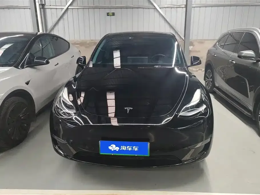 Tesla Model Y — фото 8
