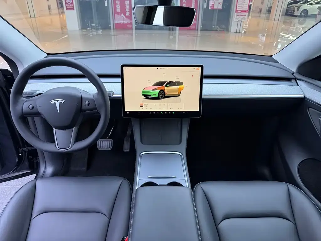 Tesla Model Y — фото 8
