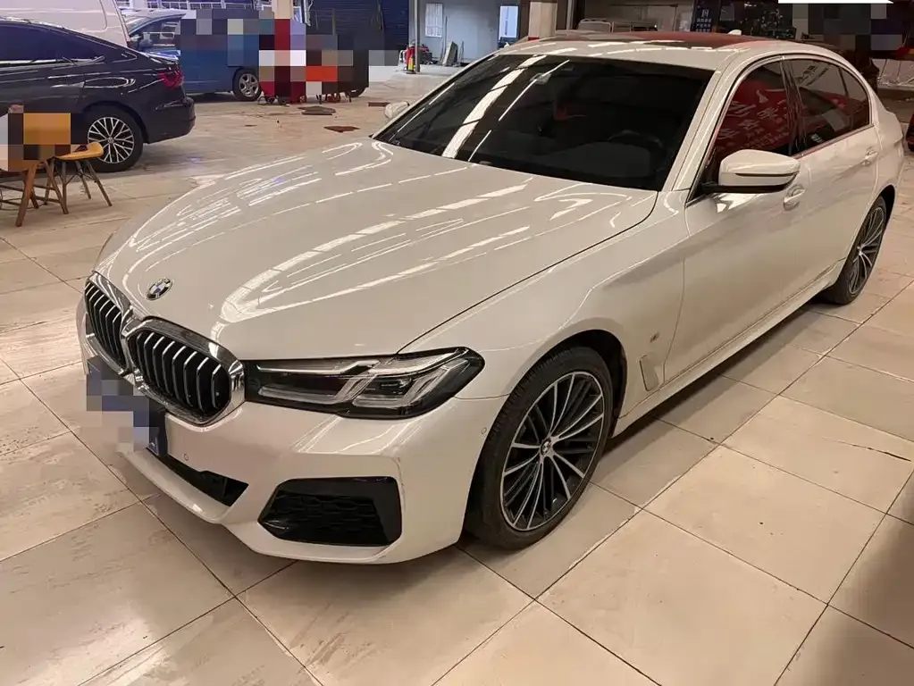BMW 5 Series — фото 1