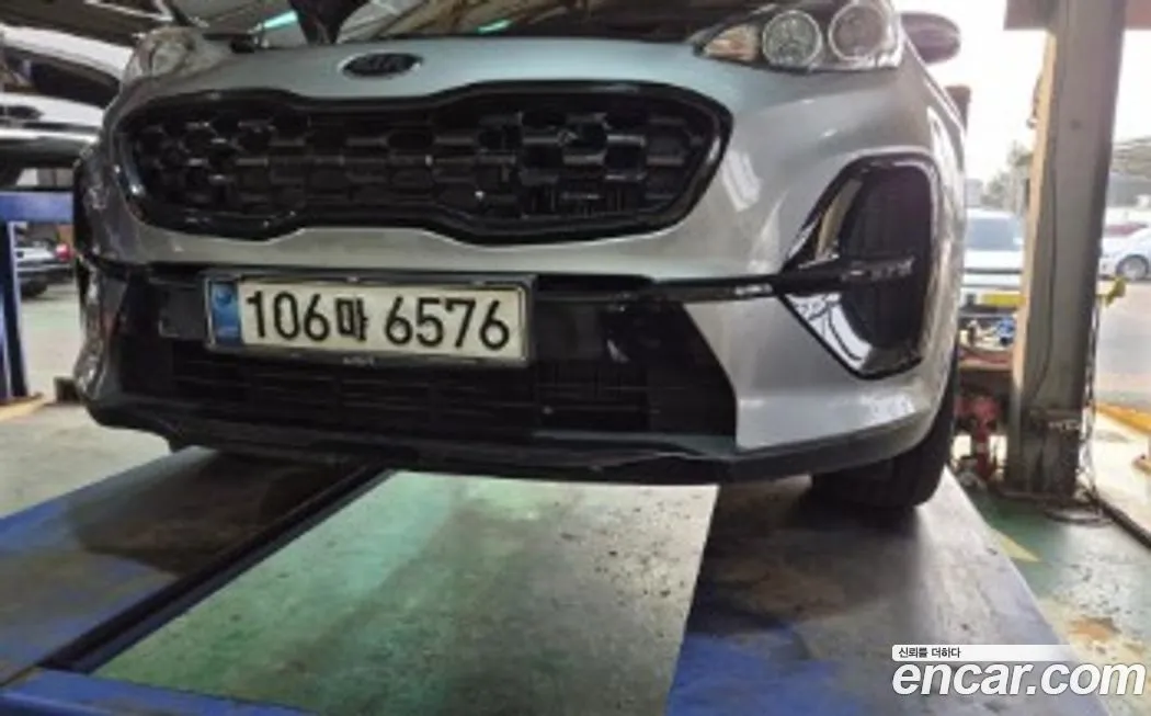 Kia Sportage — фото 1