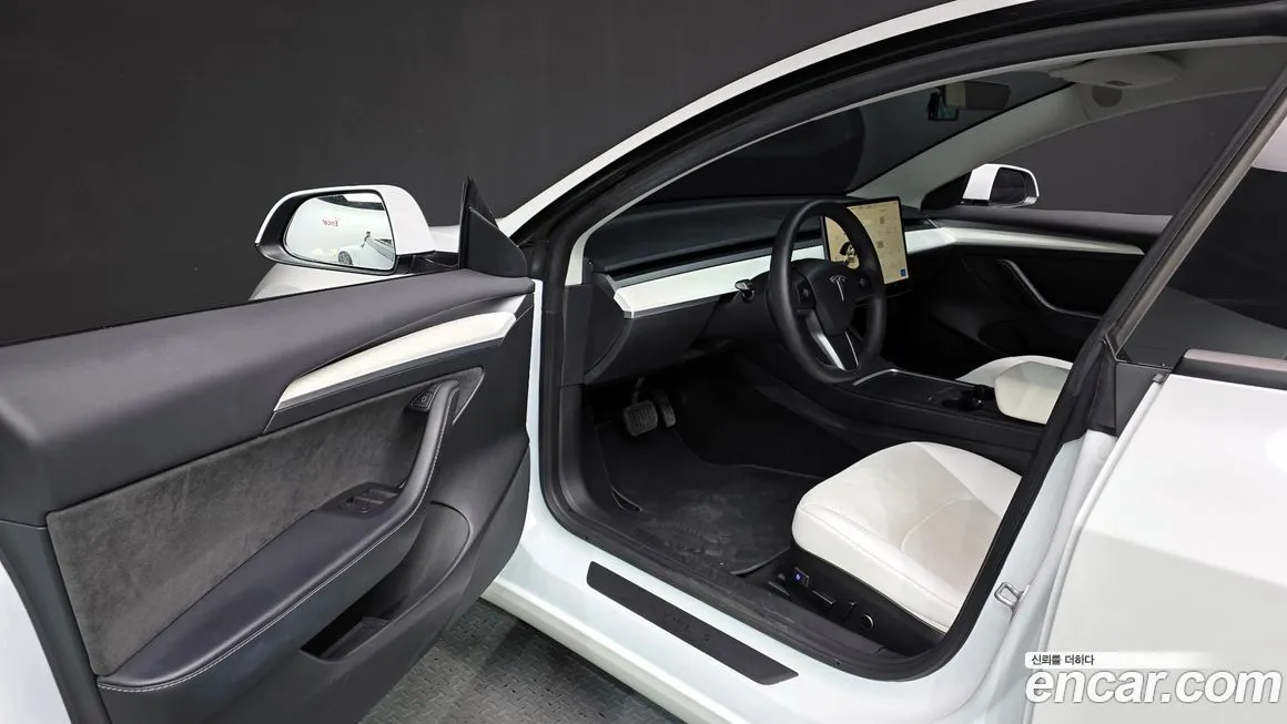 Tesla Model 3 — фото 9
