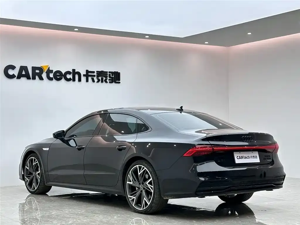 Audi A7L — фото 8