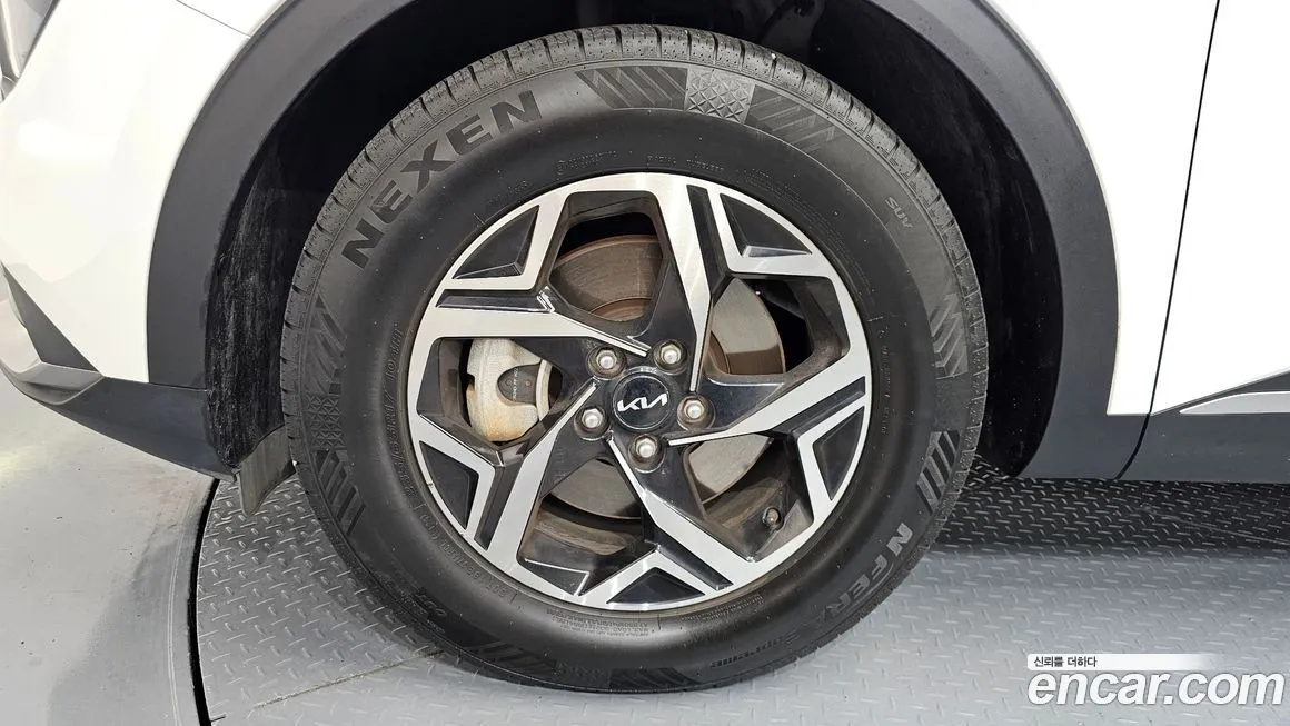 Kia Sportage — фото 6