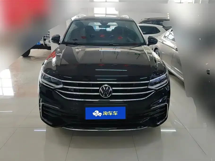 Volkswagen Tiguan L — фото 2