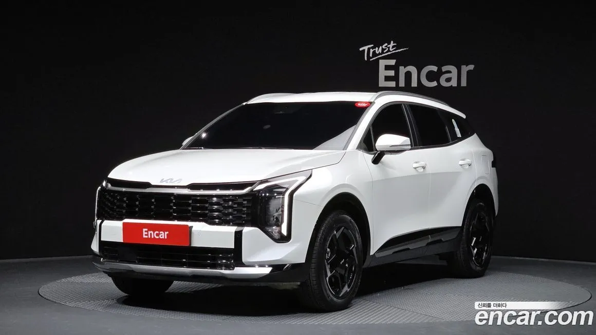 Kia Sportage — фото 1