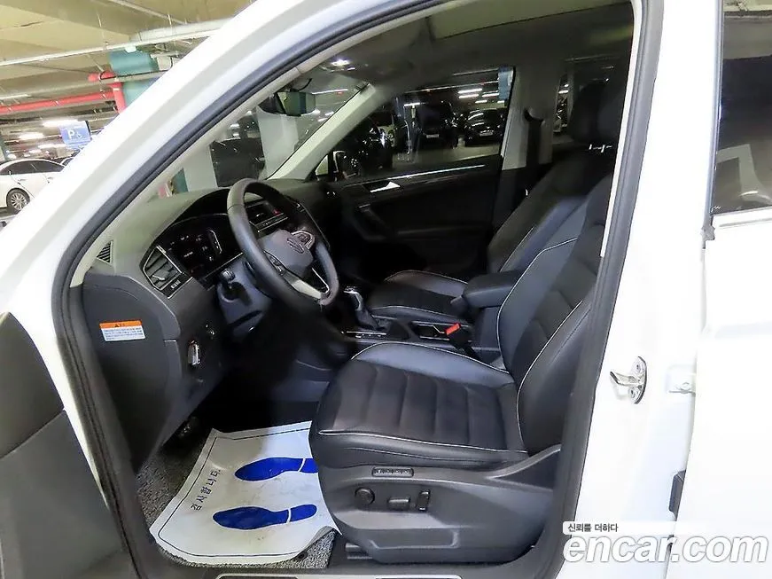 Volkswagen Tiguan — фото 10