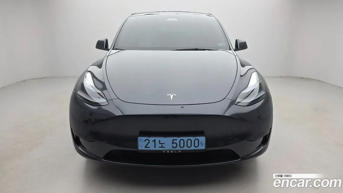 Tesla Model Y — фото 6