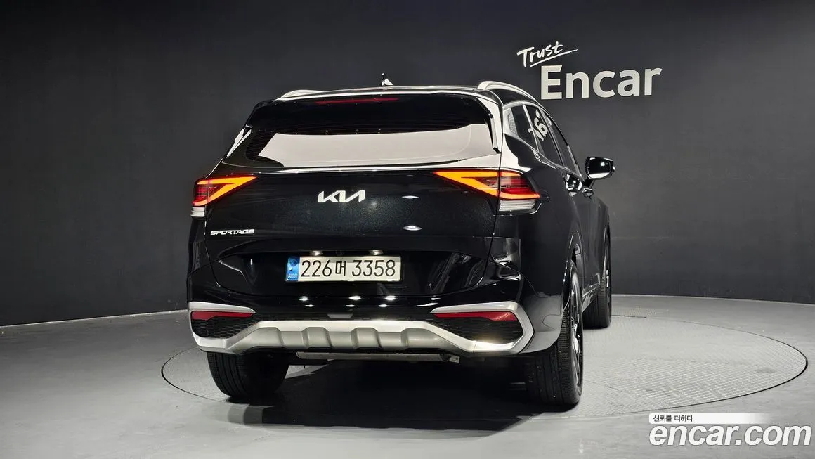 Kia Sportage — фото 10