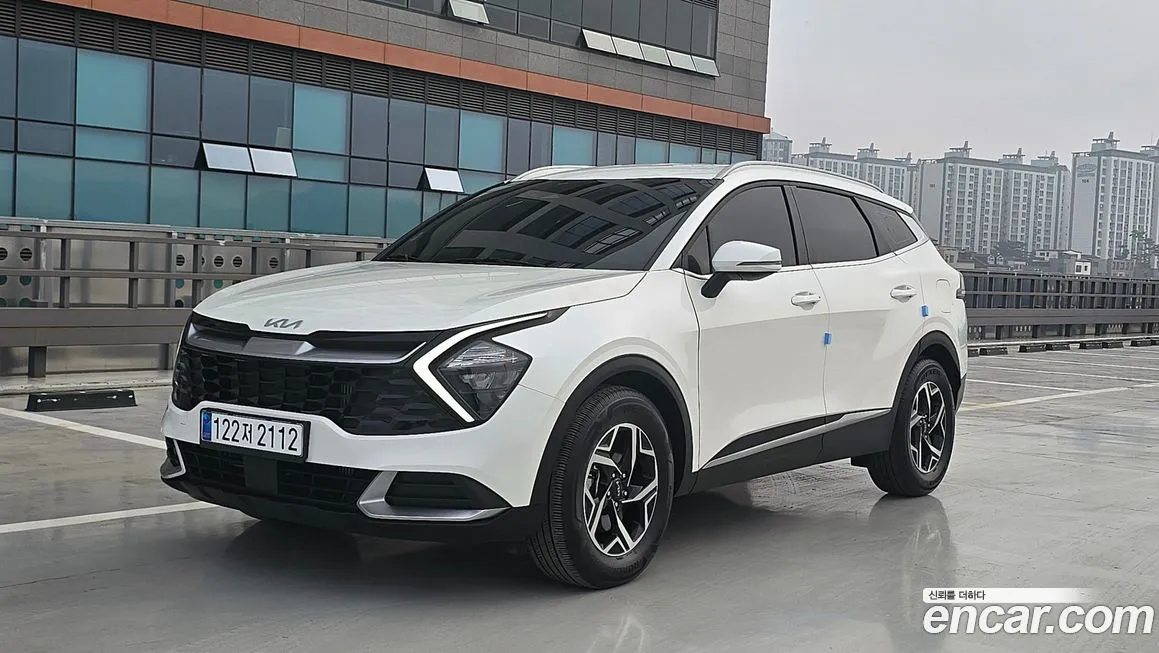 Kia Sportage — фото 1