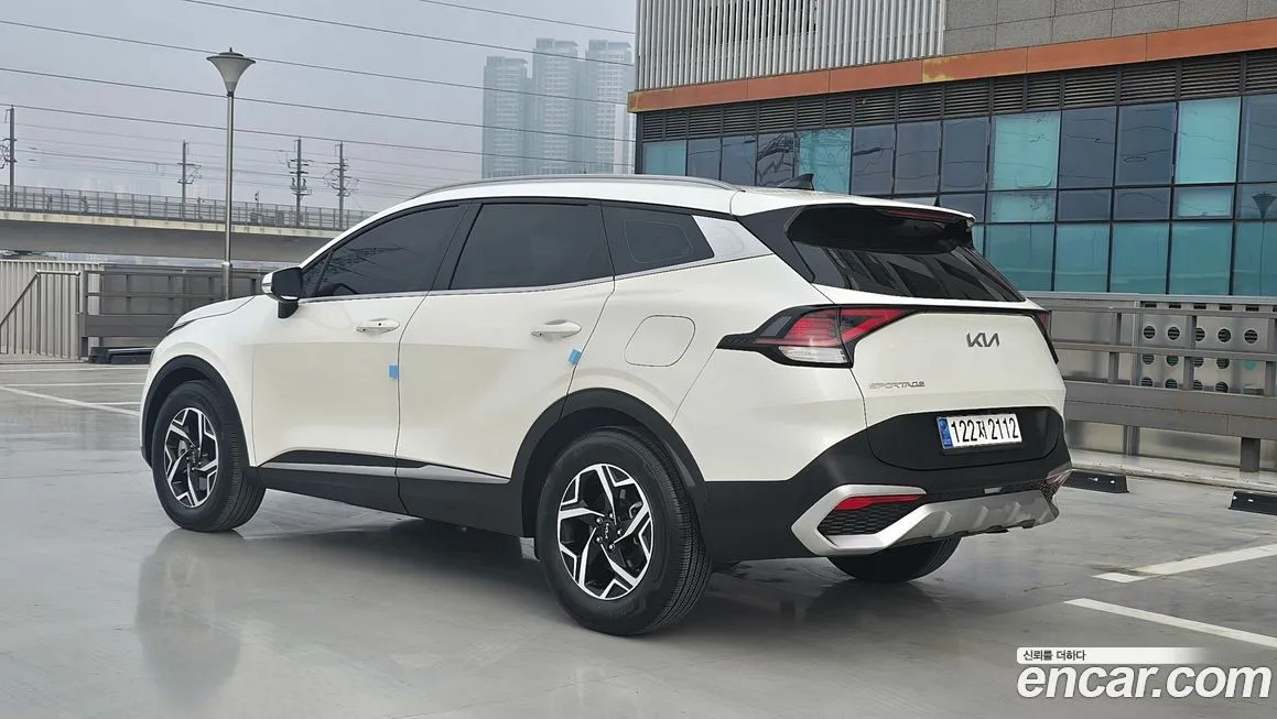 Kia Sportage — фото 7