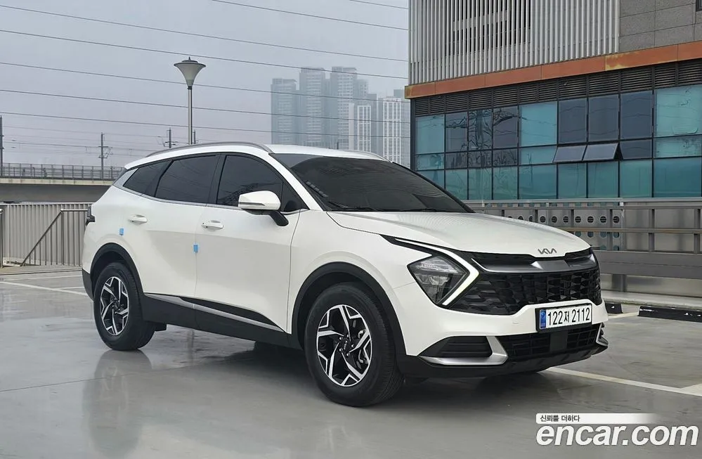 Kia Sportage — фото 5