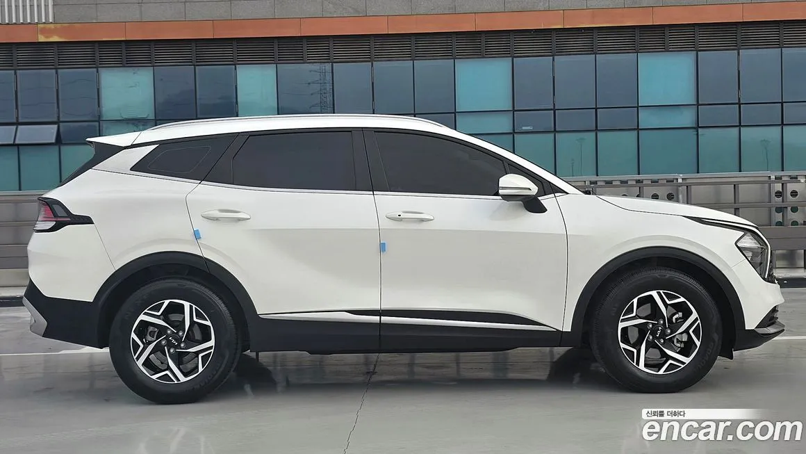 Kia Sportage — фото 9