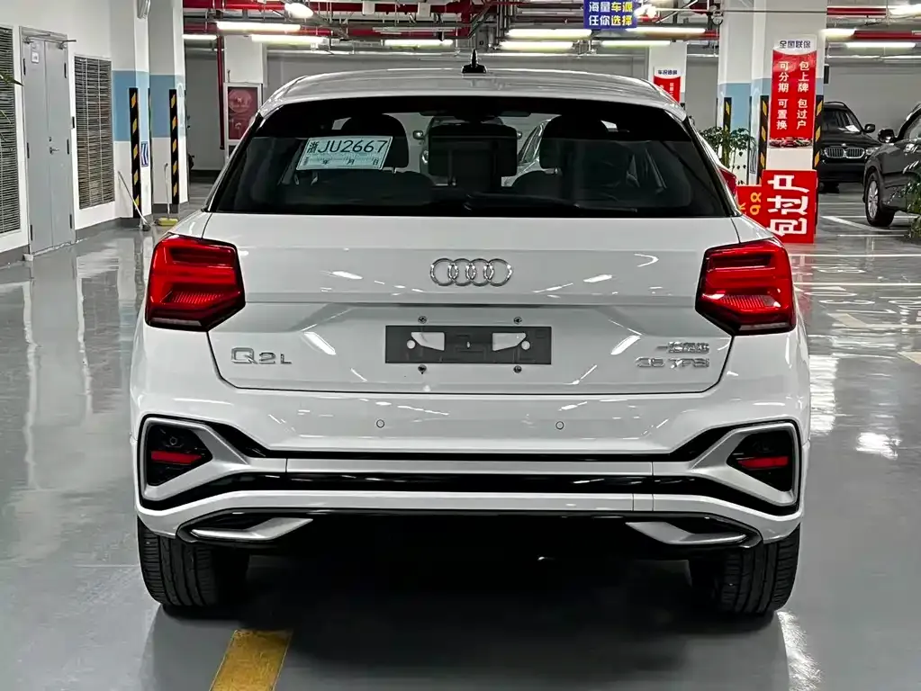 Audi Q2L — фото 7
