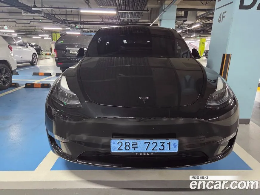 Tesla Model Y — фото 1