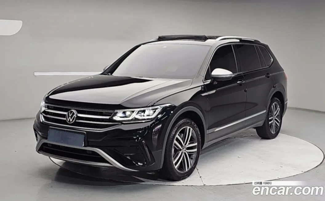 Volkswagen Tiguan — фото 1
