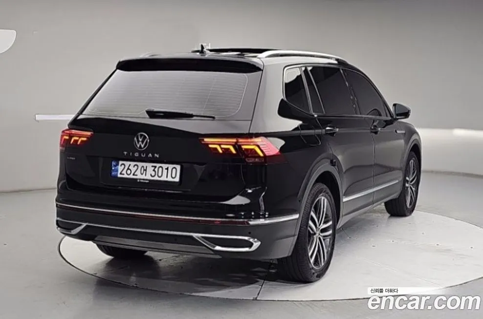 Volkswagen Tiguan — фото 7