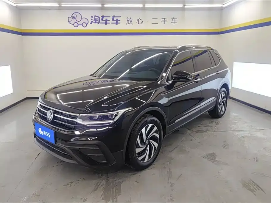 Volkswagen Tiguan L — фото 1