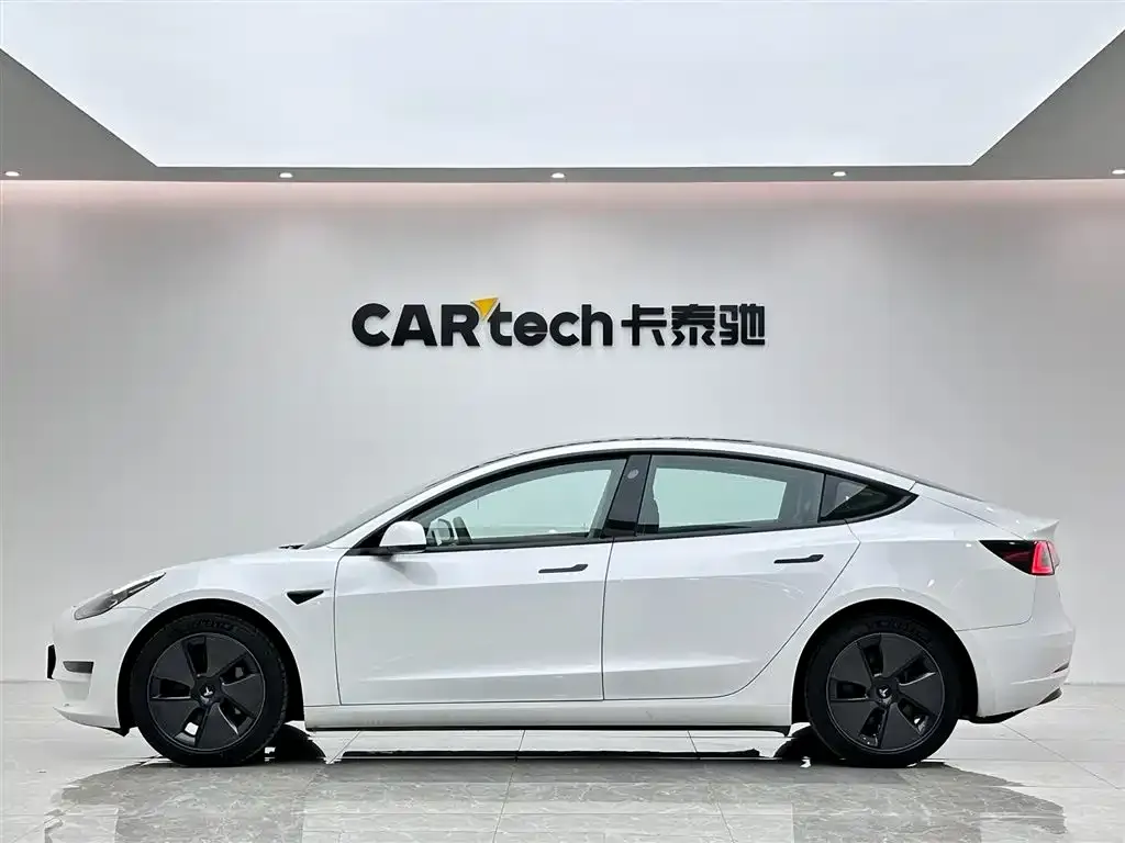 Tesla Model 3 — фото 10
