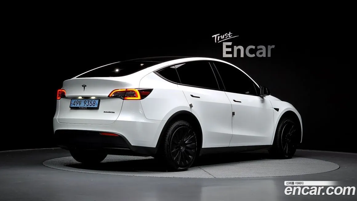 Tesla Model Y — фото 7