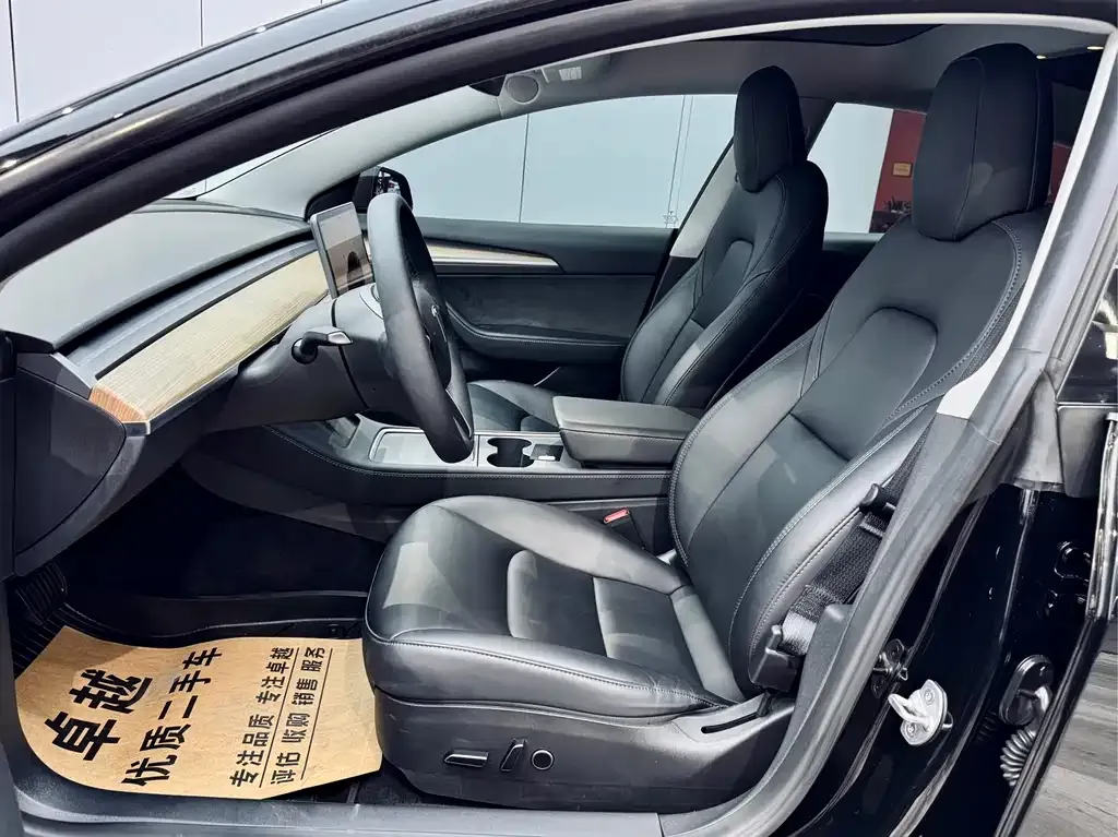 Tesla Model 3 — фото 10