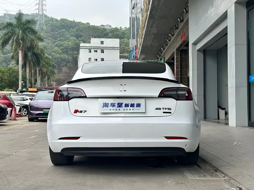 Tesla Model 3 — фото 9