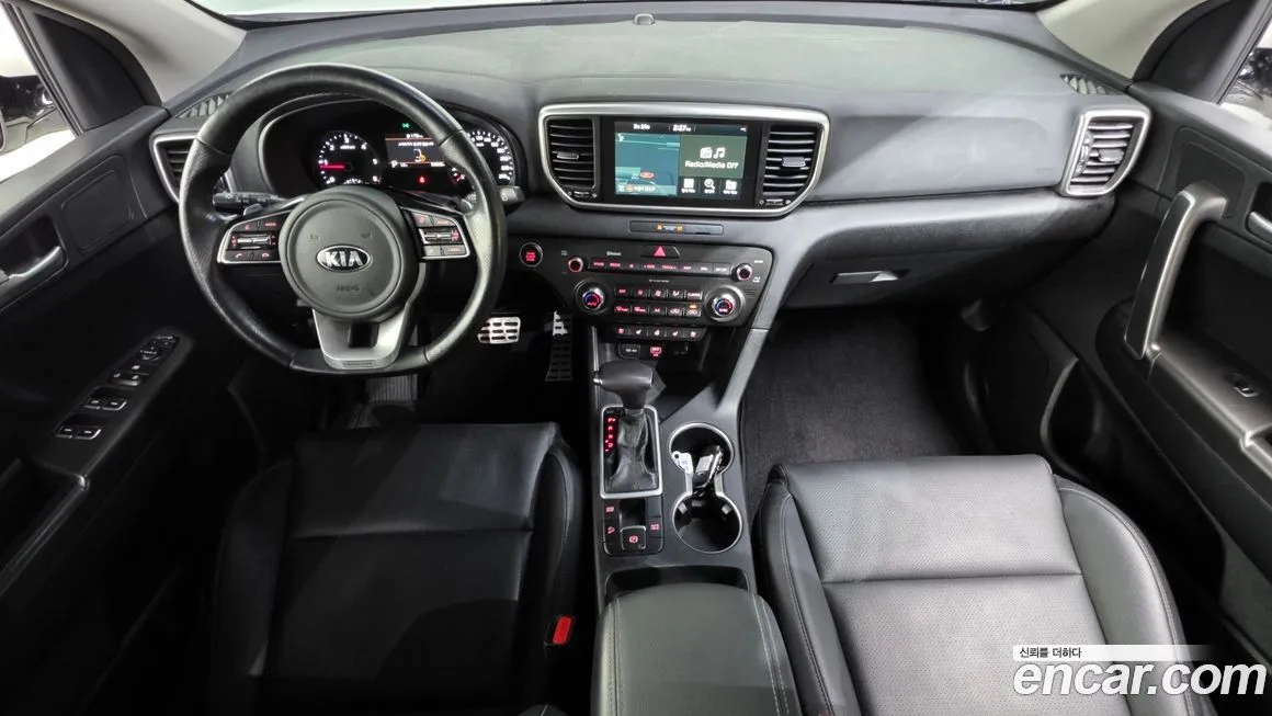 Kia Sportage — фото 7