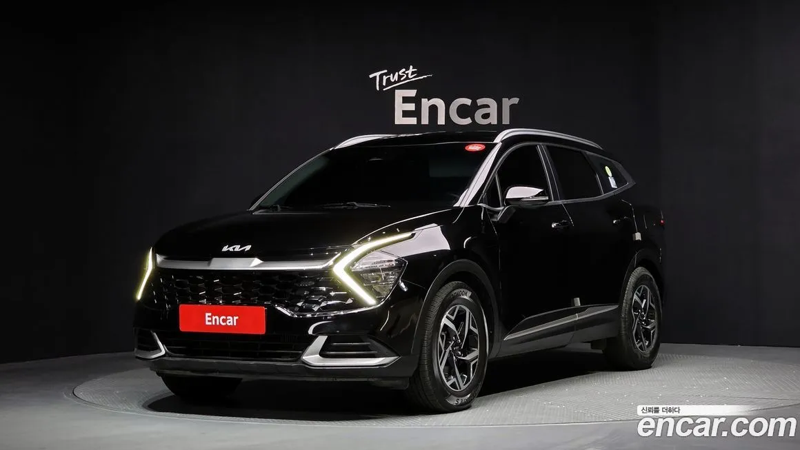 Kia Sportage — фото 1