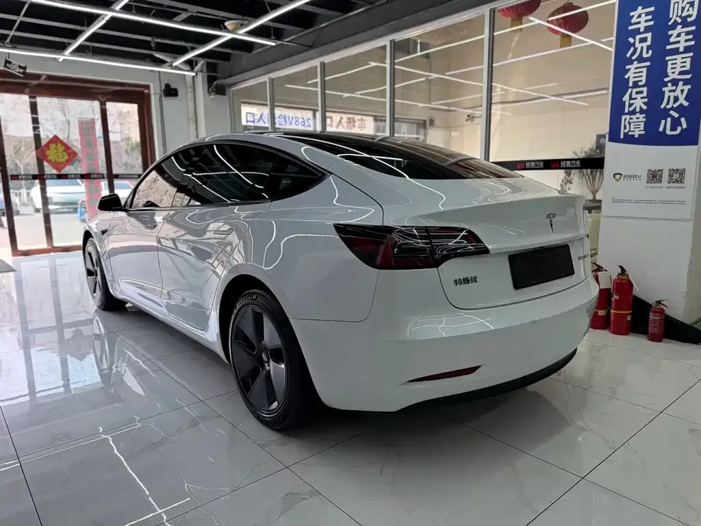 Tesla Model 3 — фото 10