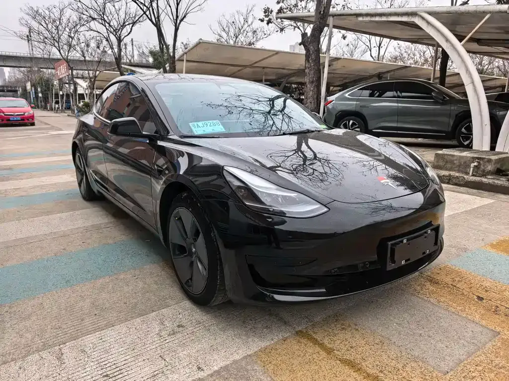 Tesla Model 3 — фото 7