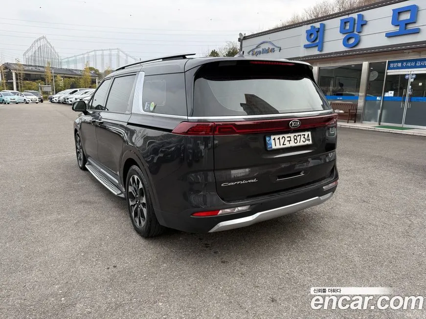 Kia Carnival — фото 10