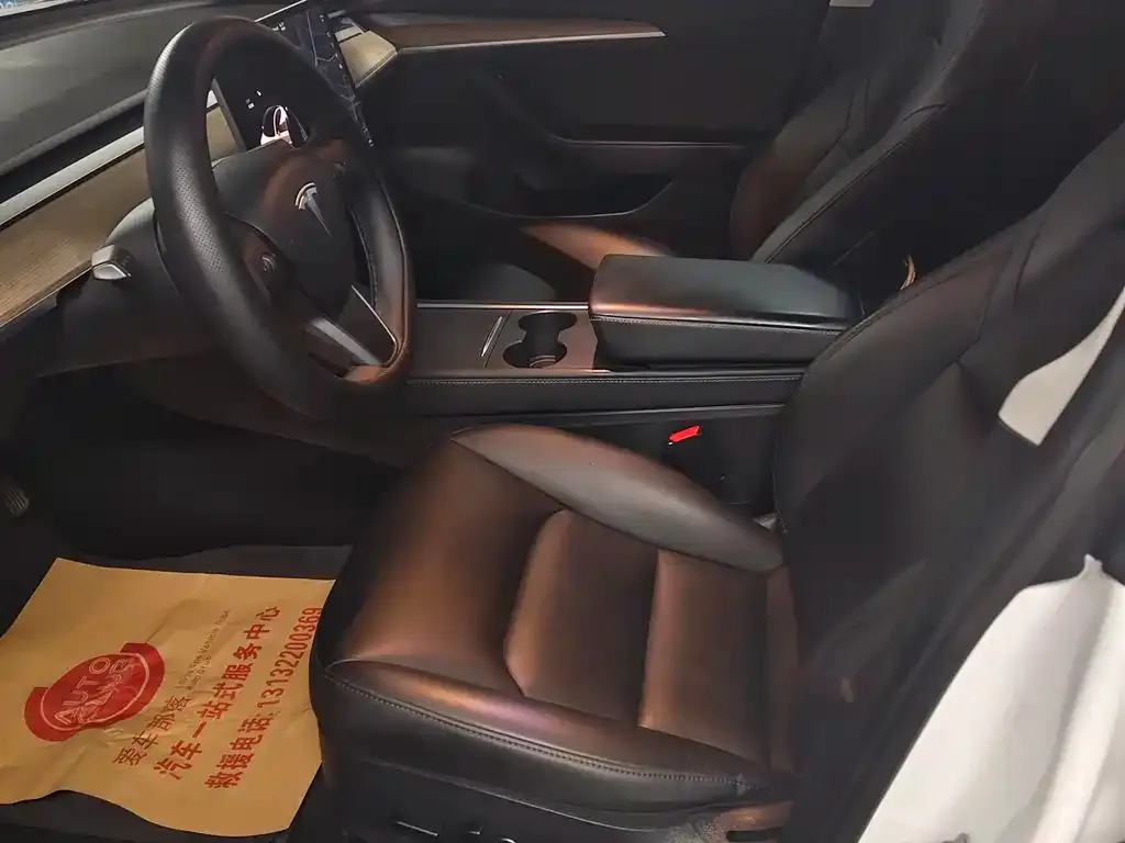 Tesla Model 3 — фото 4