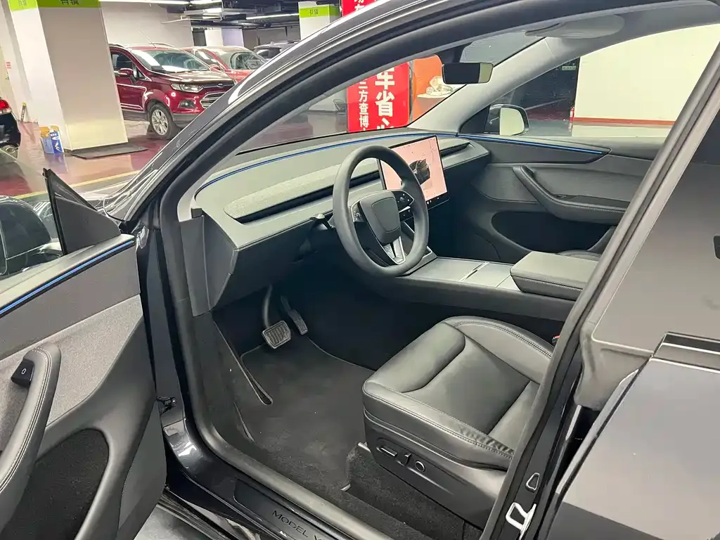 Tesla Model Y — фото 9