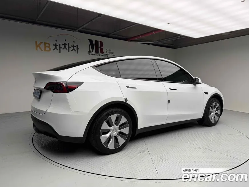 Tesla Model Y — фото 2