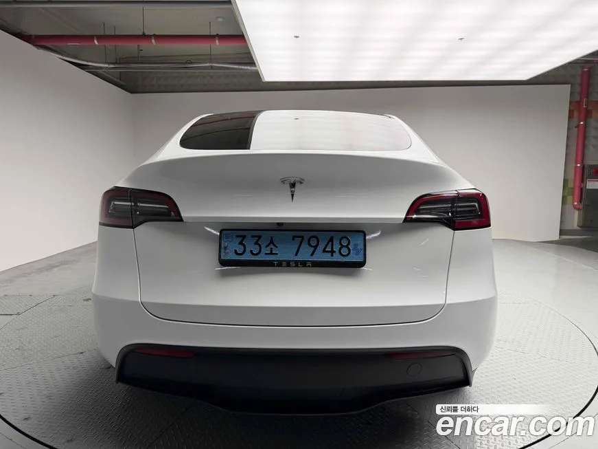 Tesla Model Y — фото 8