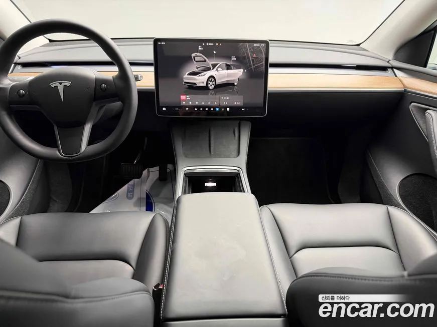 Tesla Model Y — фото 10