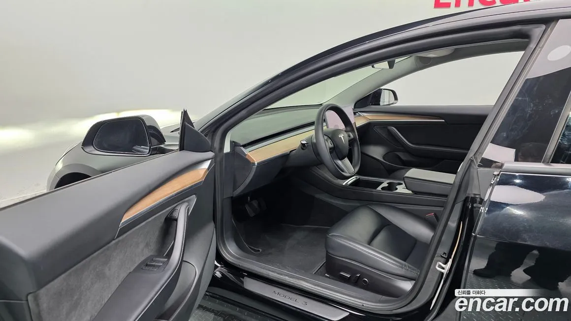 Tesla Model 3 — фото 10
