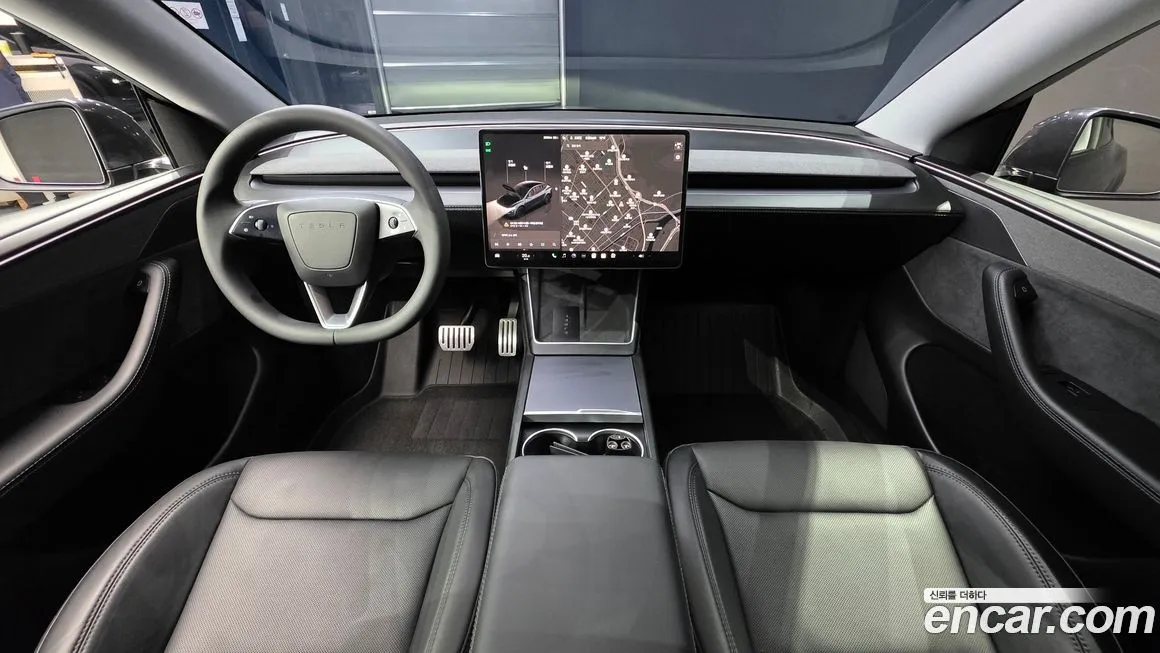 Tesla Model Y — фото 10