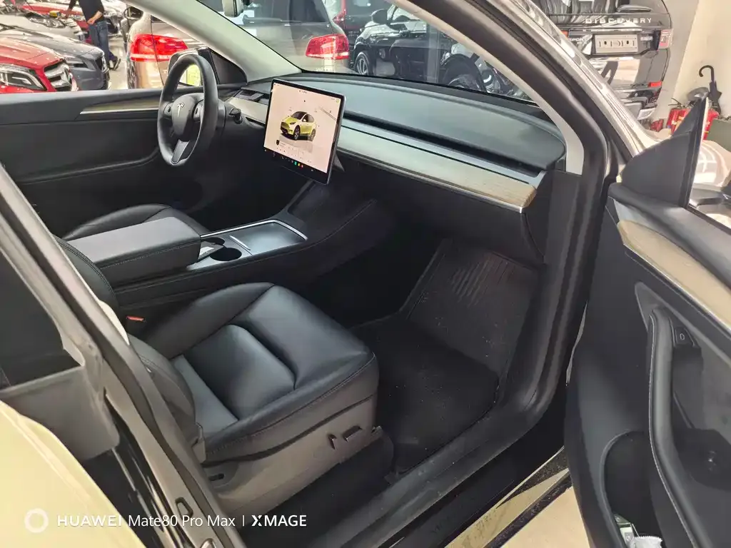 Tesla Model Y — фото 6