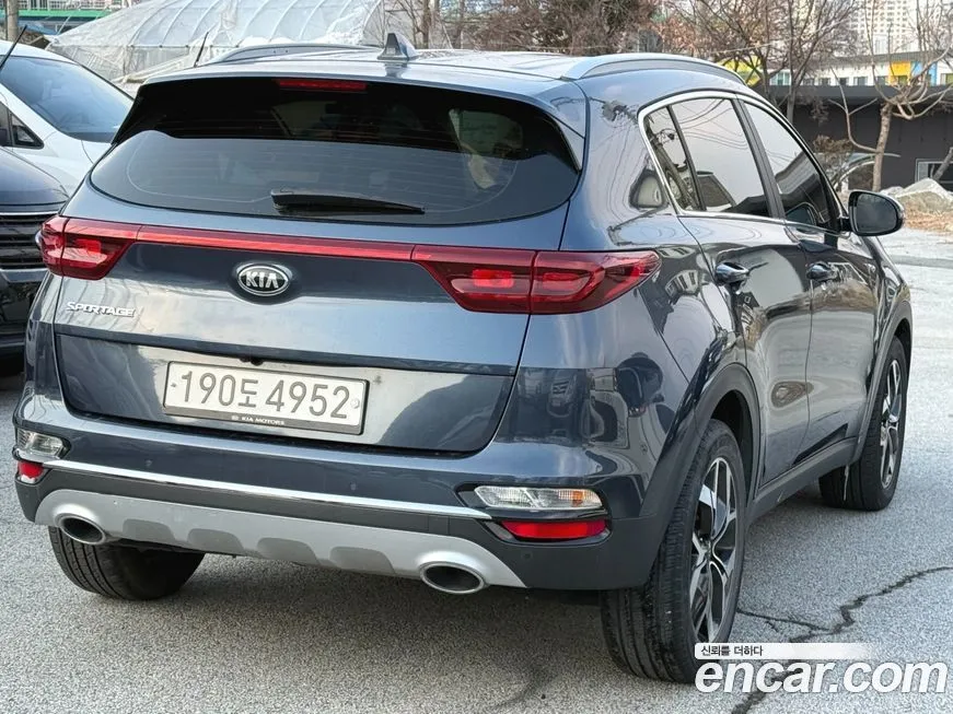 Kia Sportage — фото 10