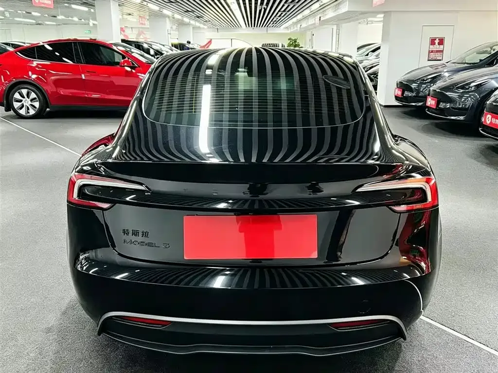 Tesla Model 3 — фото 7