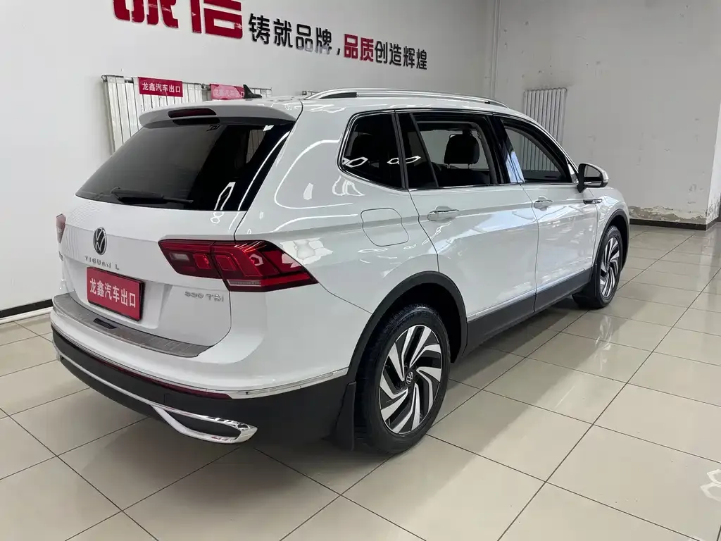 Volkswagen Tiguan L — фото 7