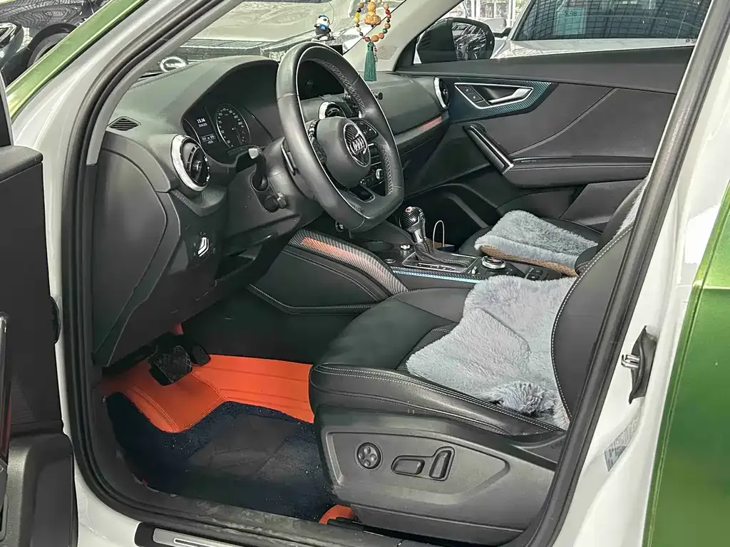 Audi Q2L — фото 6