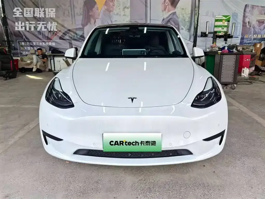 Tesla Model Y — фото 10