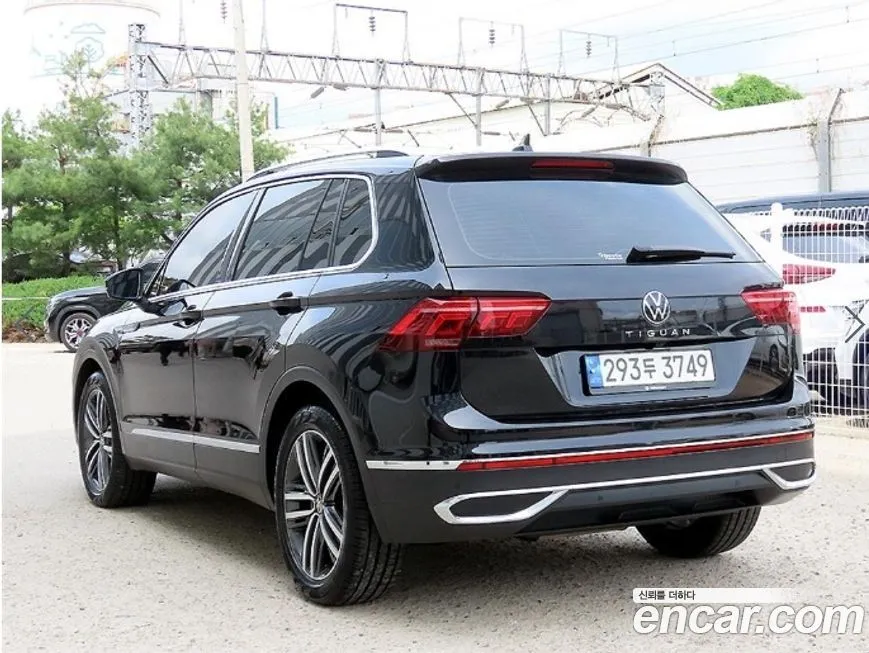Volkswagen Tiguan — фото 1