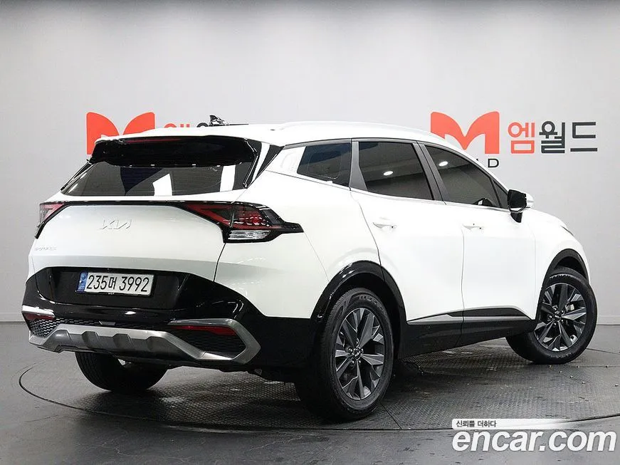 Kia Sportage — фото 7
