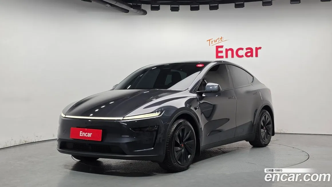 Tesla Model Y — фото 1