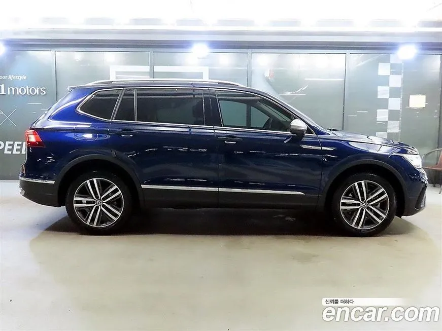 Volkswagen Tiguan — фото 6