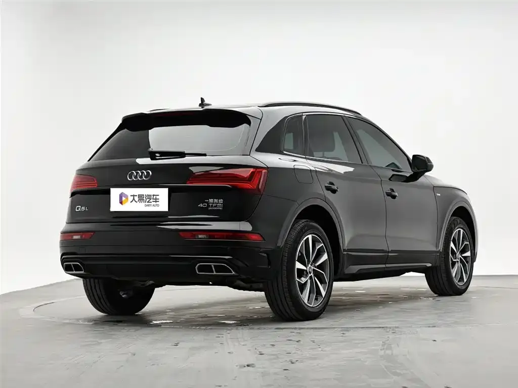 Audi Q5L — фото 8